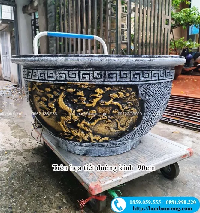 Chậu trồng cây hình tròn bằng xi măng