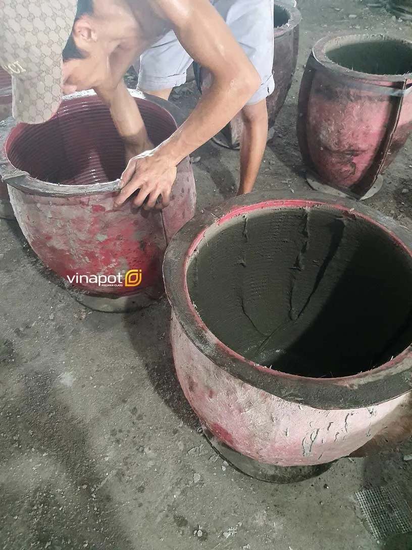 Những mẫu chậu xi măng kích thước lớn tạo điểm nhấn sang trọng cho không gian kiến trúc