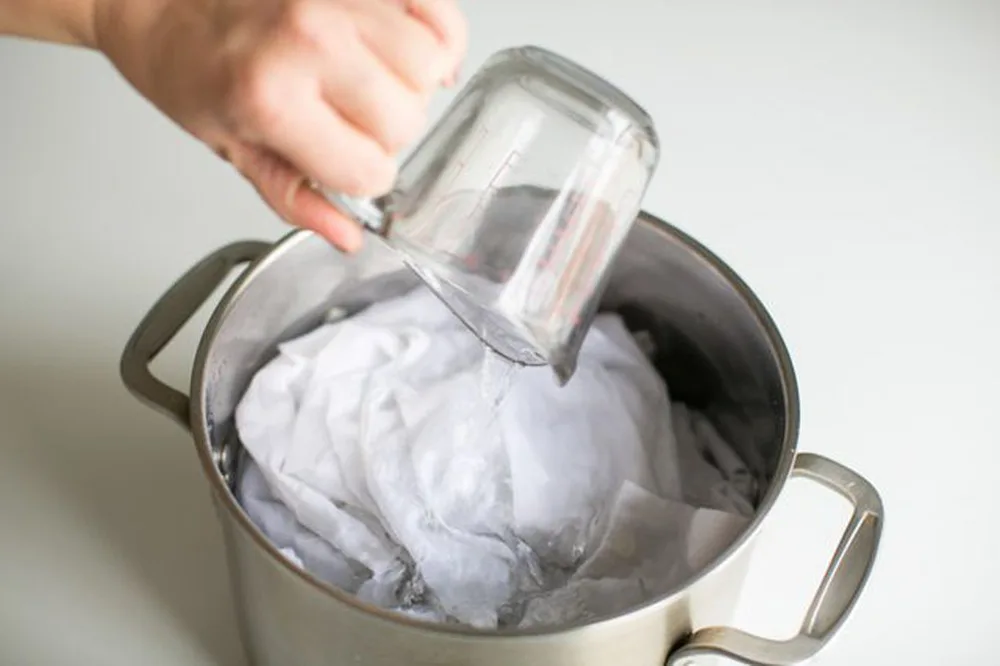 Kết quả sau khi giặt sạch vết xi măng trên quần áo